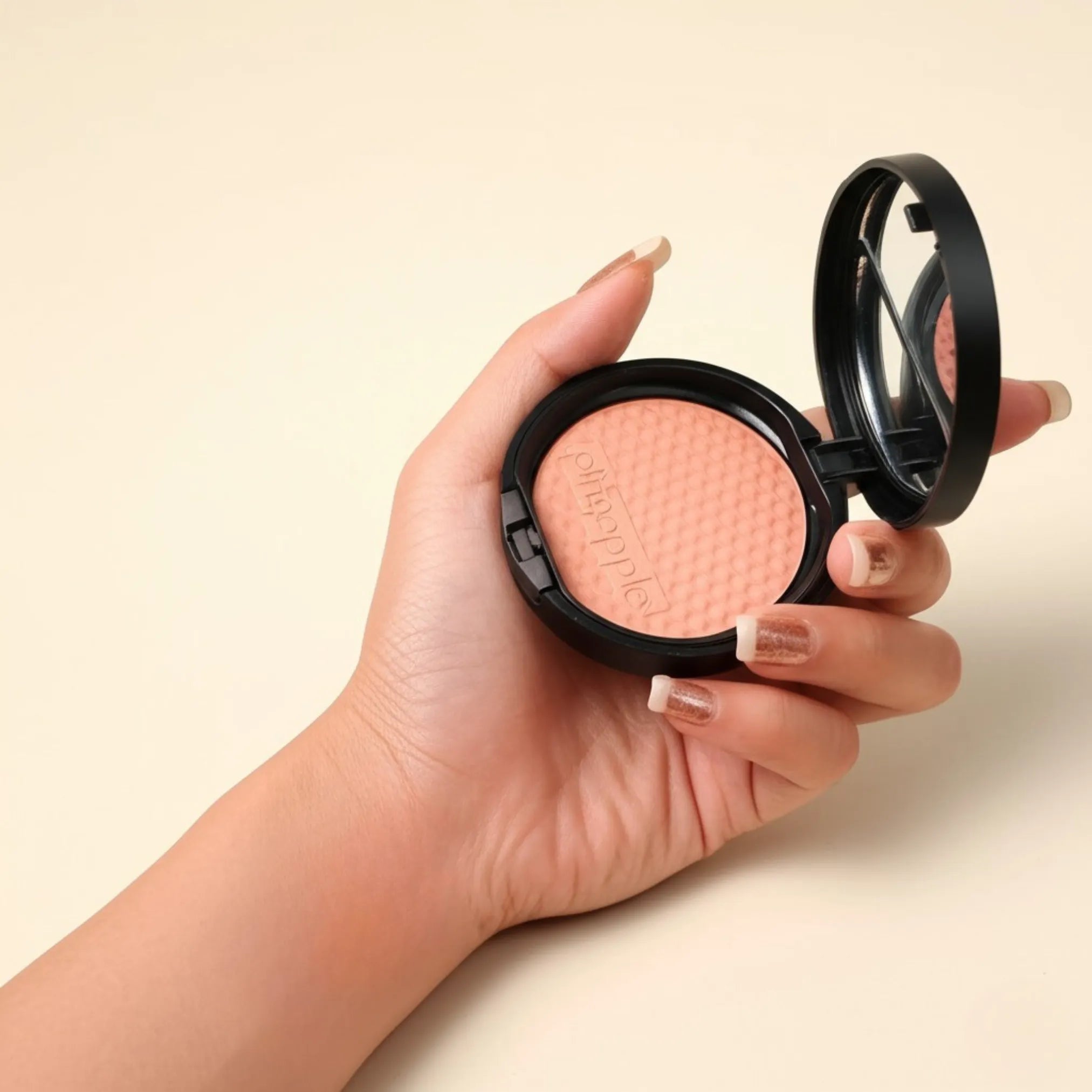 Bronzer Blush in a woman's hand